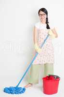 Young Woman Cleaning with mop and bucket