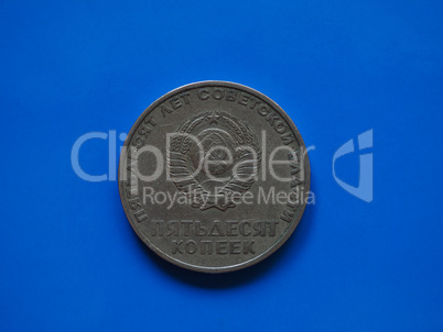 Vintage Russian ruble coin over blue