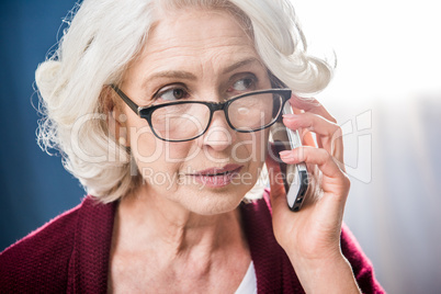 Woman talking on smartphone