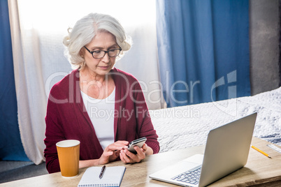 Woman using smartphone