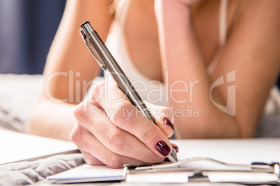 Girl making notes