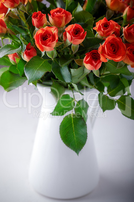 Big Bouquet of fresh Red Roses on a white background.