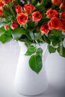 Big Bouquet of fresh Red Roses on a white background.