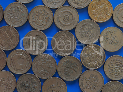 One Pound (GBP) coin, United Kingdom (UK) over blue