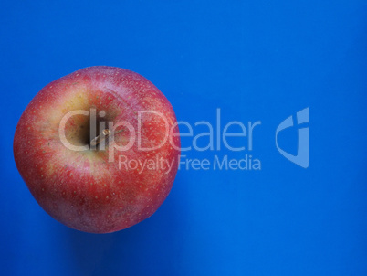 red apple fruit food over blue