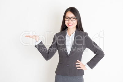 Businesswoman hand holding something