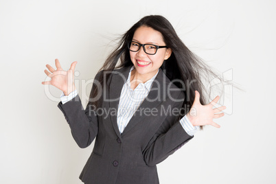 Portrait of happy Asian businesswoman