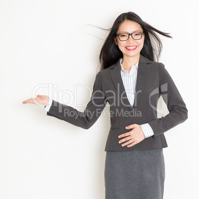 Businesswoman hand showing something