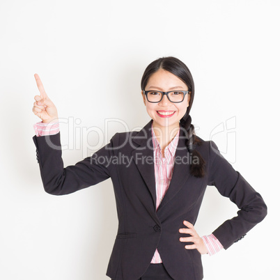 Businesswoman finger pointing something