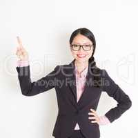 Businesswoman finger pointing something