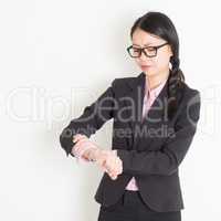 Businesswoman checking times