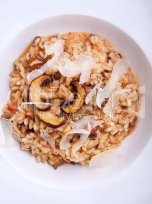 Mushroom risotto Italian cuisine placed on a white background.