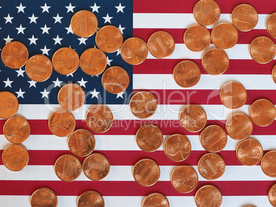 Dollar coins and flag of the United States