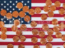 Dollar coins and flag of the United States