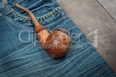 Smoking wooden pipe