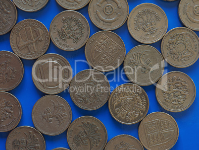 One Pound (GBP) coin, United Kingdom (UK) over blue