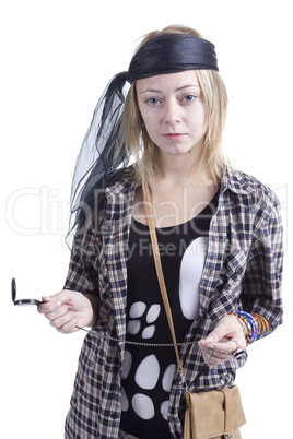 Young woman in the image of a pirate