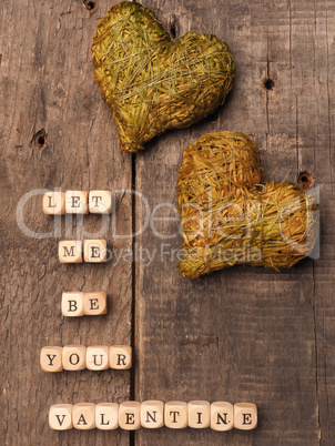 Wooden dices with heart shape