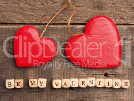 Wooden dices with heart shape