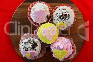 Five colorful cupcakes