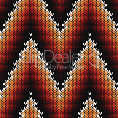 Knitted seamless pattern in warm hues