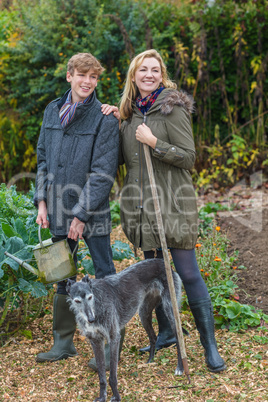 Mother and Teenage Son, Woman and Boy, Gardening
