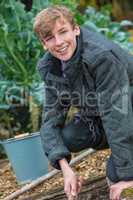 Happy Teenager Boy Male Young Adult Gardening
