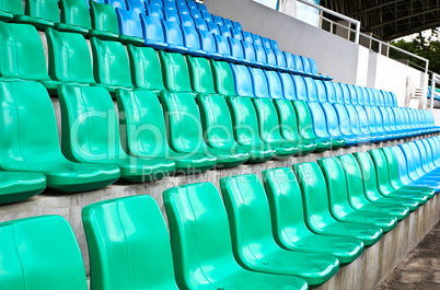 Green and blue stadium seats.