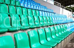 Green and blue stadium seats.