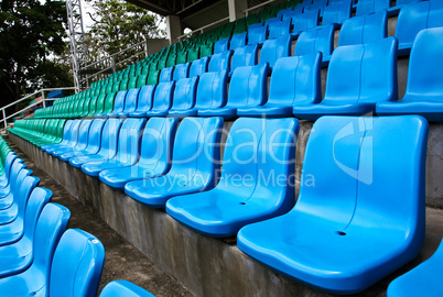 Green and blue stadium seats.