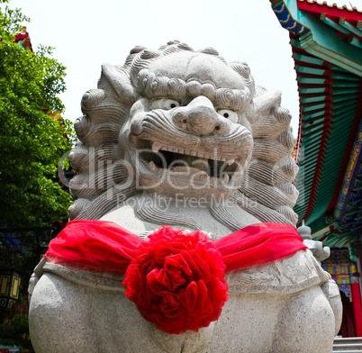 Chinese Lion Stone Sculpture in the Chinese Temple in Nonthaburi