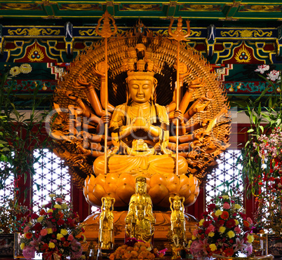 Thousand hands wooden Buddha in Chinese temple,Thailand