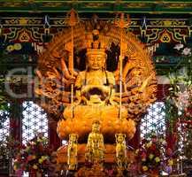 Thousand hands wooden Buddha in Chinese temple,Thailand