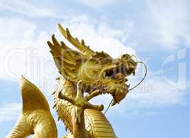 Chinese Golden Dragon Statue in Phuket, Thailand.
