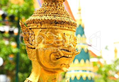 Golden statue in Wat Phra Keao in the Grand Palace in Bangkok Th