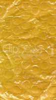Yellow bubble wrap texture background - vertical