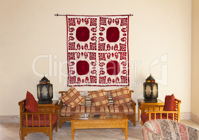 Vintage turkish arabian or indian lantern interior. Pillow on sofa decoration interior with morocco style photo Vintage turkish arabian or indian lantern interior. Pillow on sofa decoration interior with morocco style photo