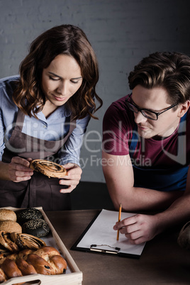 Bakers examining pastries