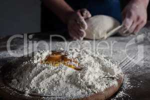 Baker kneading dough