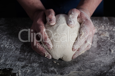 Man holding dough