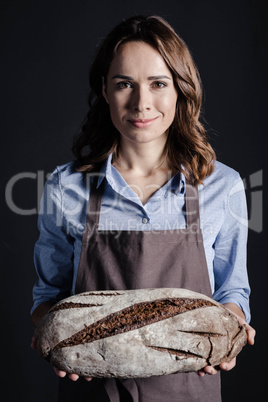 Woman holding bread