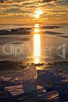 A lot of iceblocks on each other in Lake Balaton on the sunset l