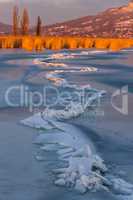 A lot of iceblocks on each other in Lake Balaton on the sunset l