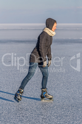 Young girl skating on Lake Balaton in Hungary