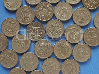 Pound coins, United Kingdom over blue