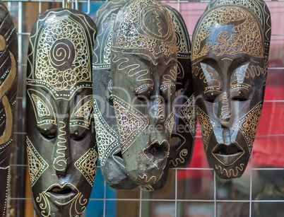 Souvenirs : masks made of wood, symbolizing human emotions.