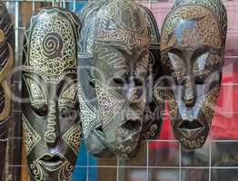 Souvenirs : masks made of wood, symbolizing human emotions.