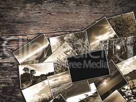 old vintage photos on a wooden background