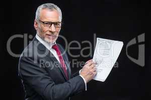 Businessman holding papers