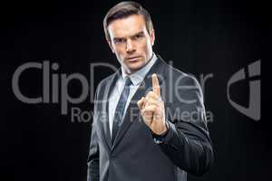 Handsome businessman gesturing